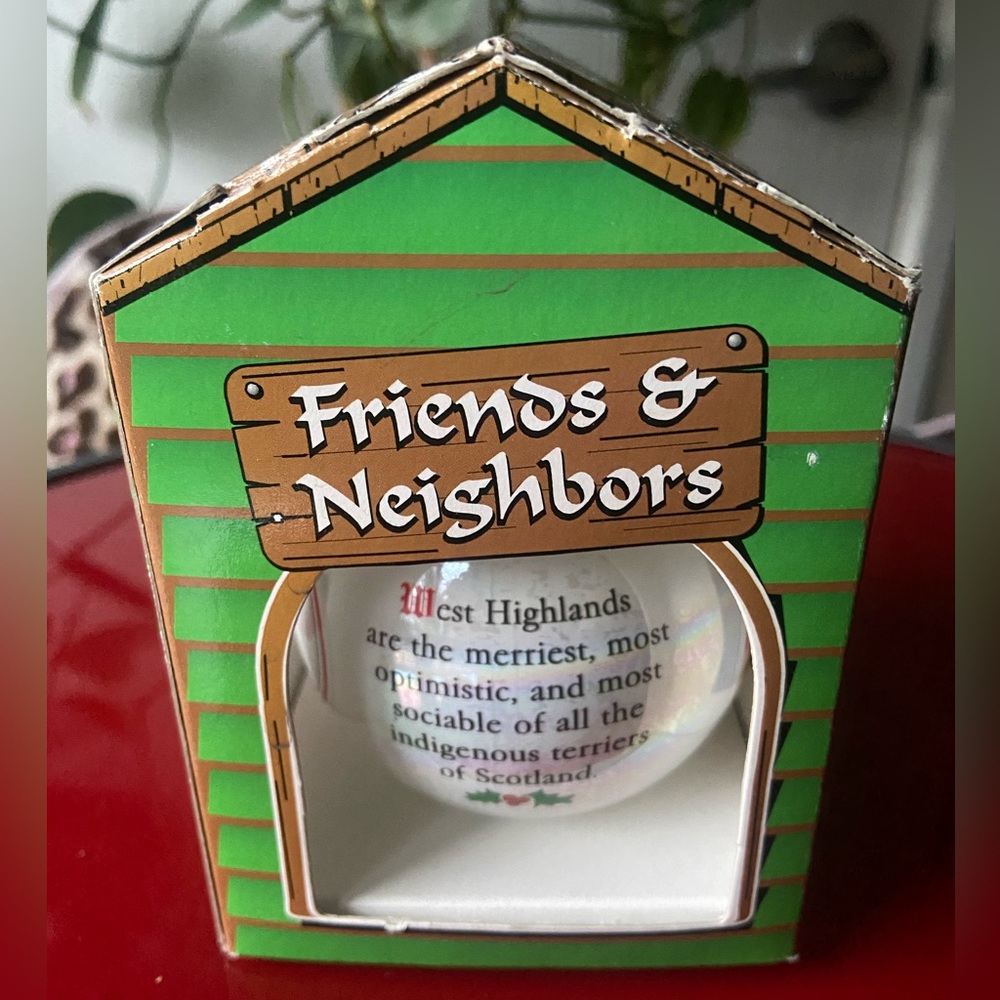Highlander’s dog Christmas ornament pkg’d in a doghouse box.
